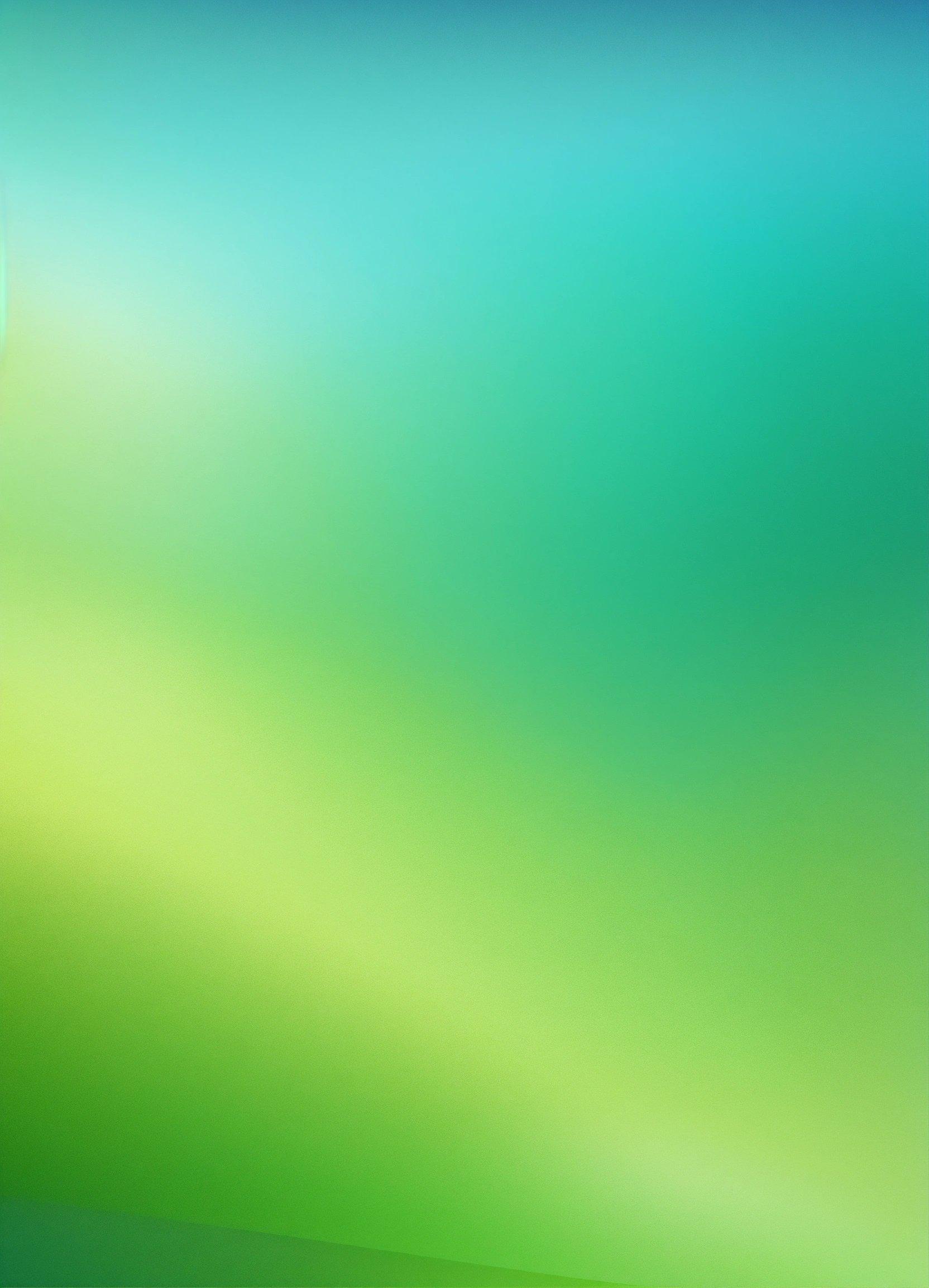 A Blurry Green And Blue Background With A Light