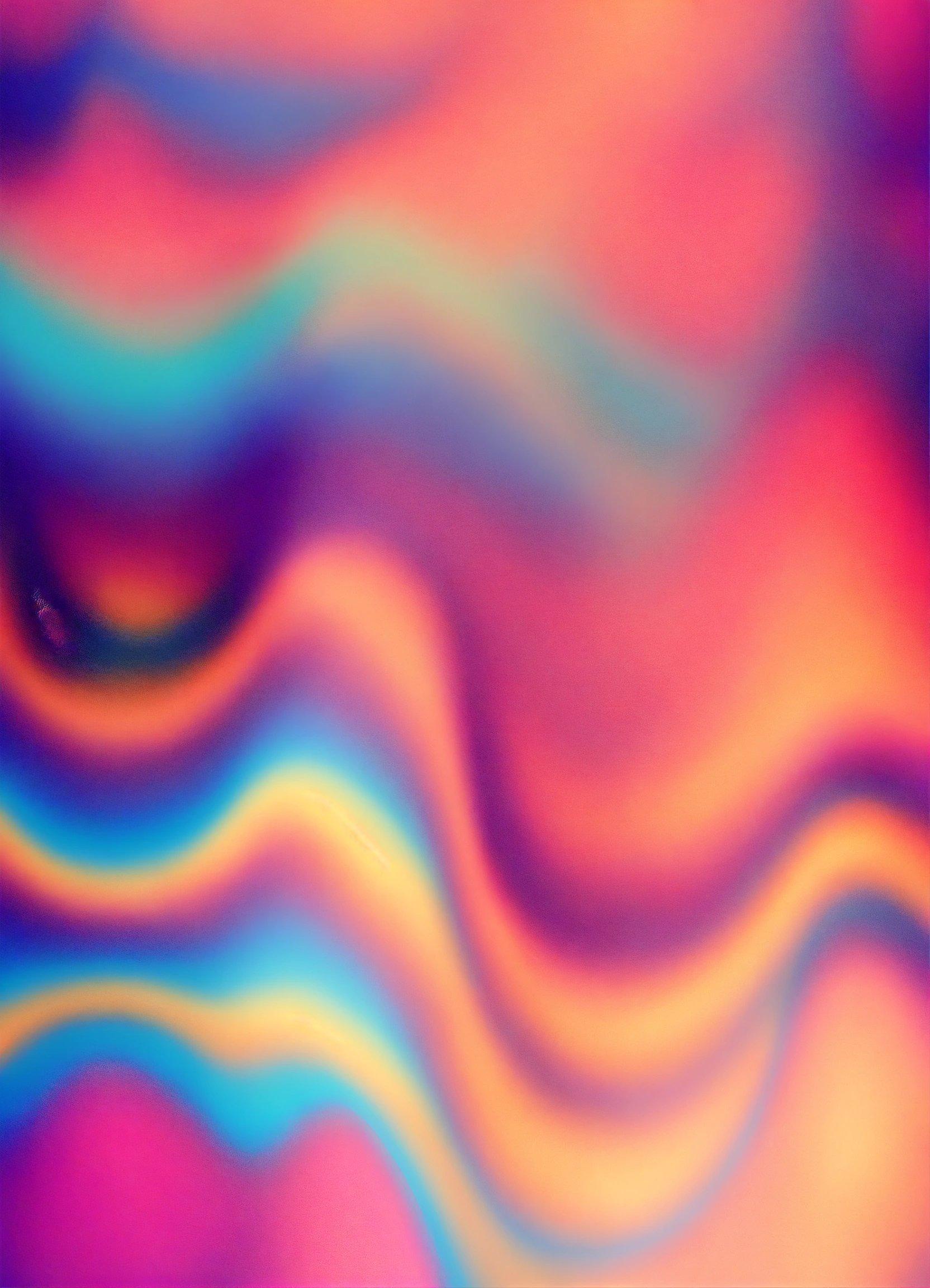 A Blurry Image Of A Colorful Background