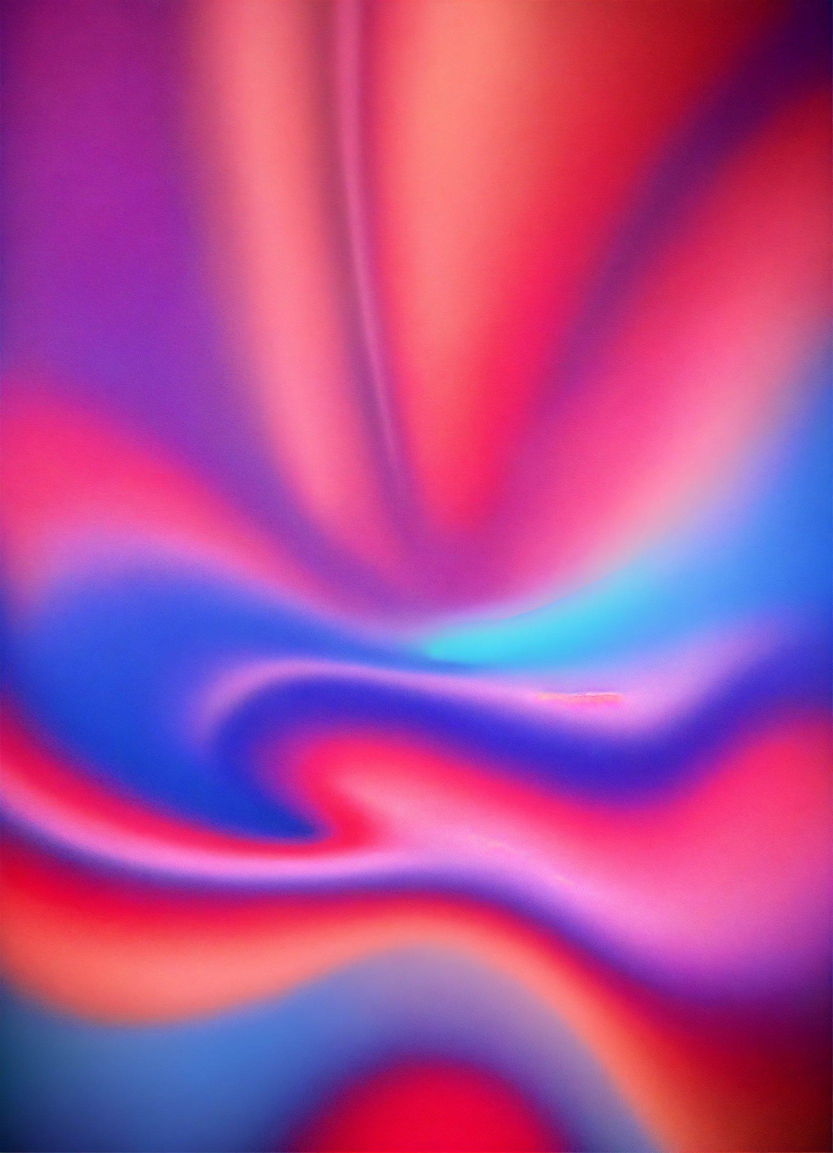 A Blurry Image Of A Red, Blue, And Pink Swirl