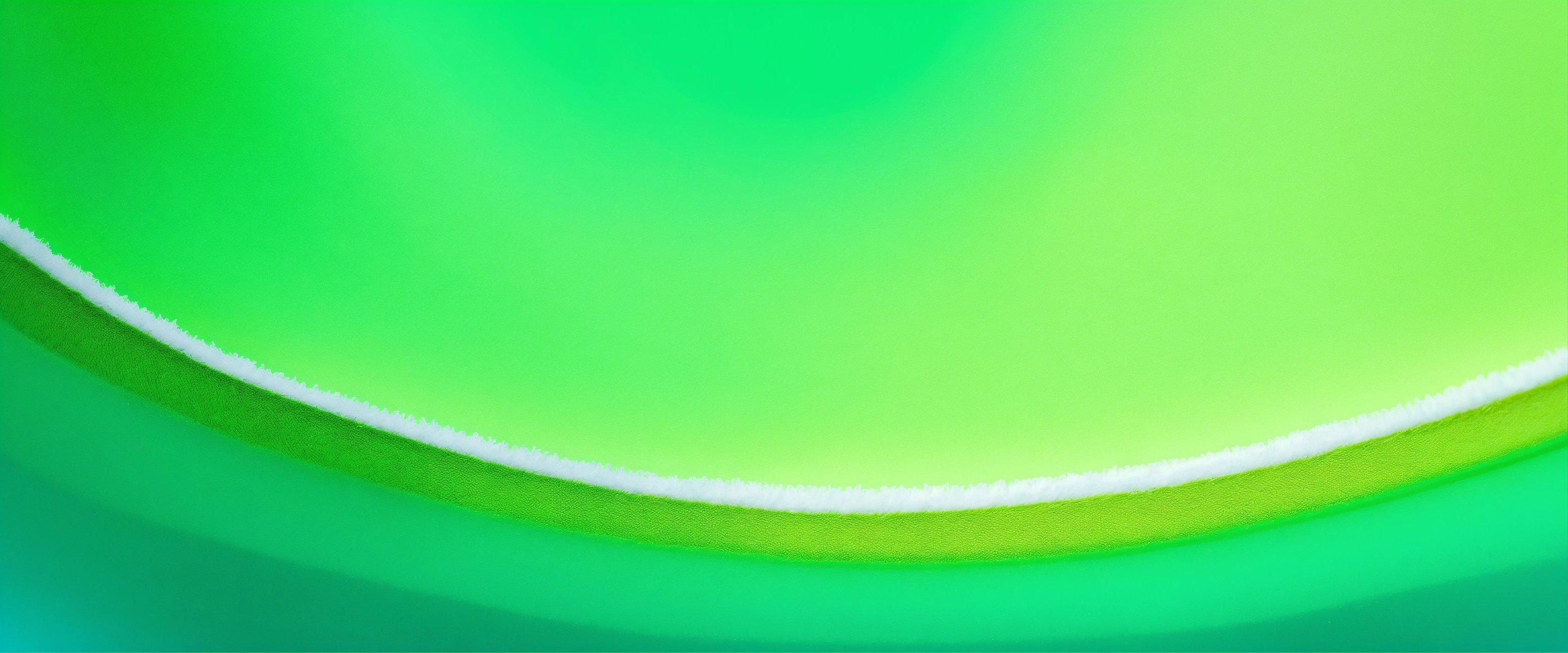 A Close Up Of A Tennis Ball With A Blurry Background