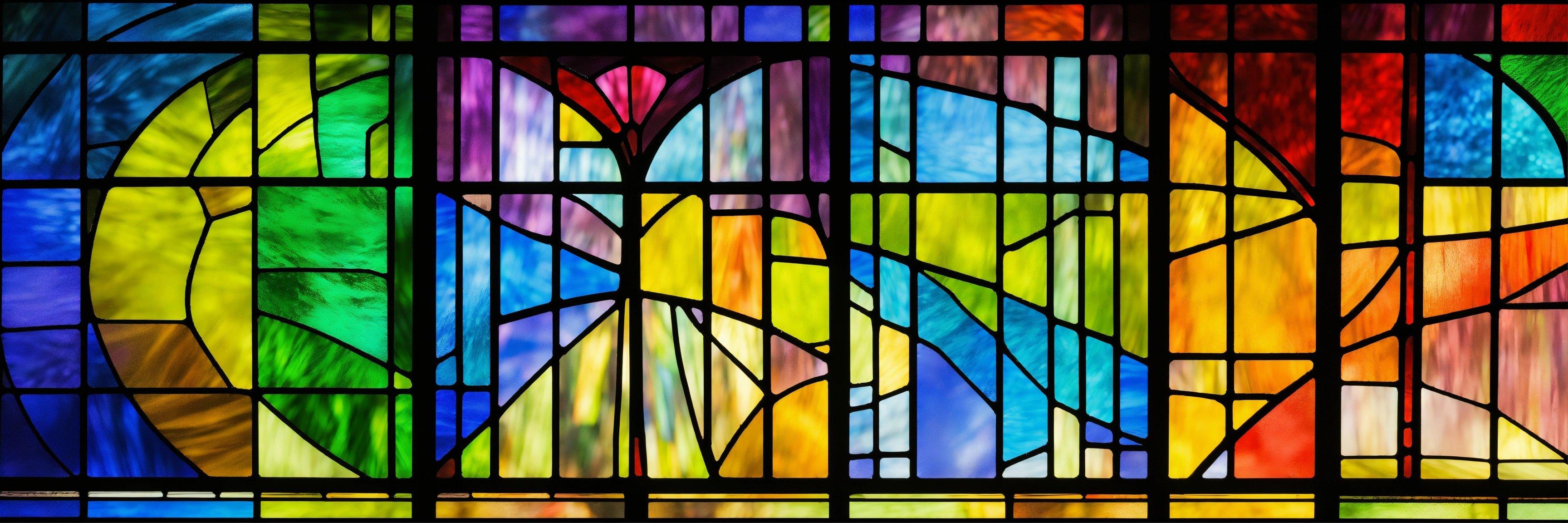 A Colorful Stained Glass Window With A Bird On It