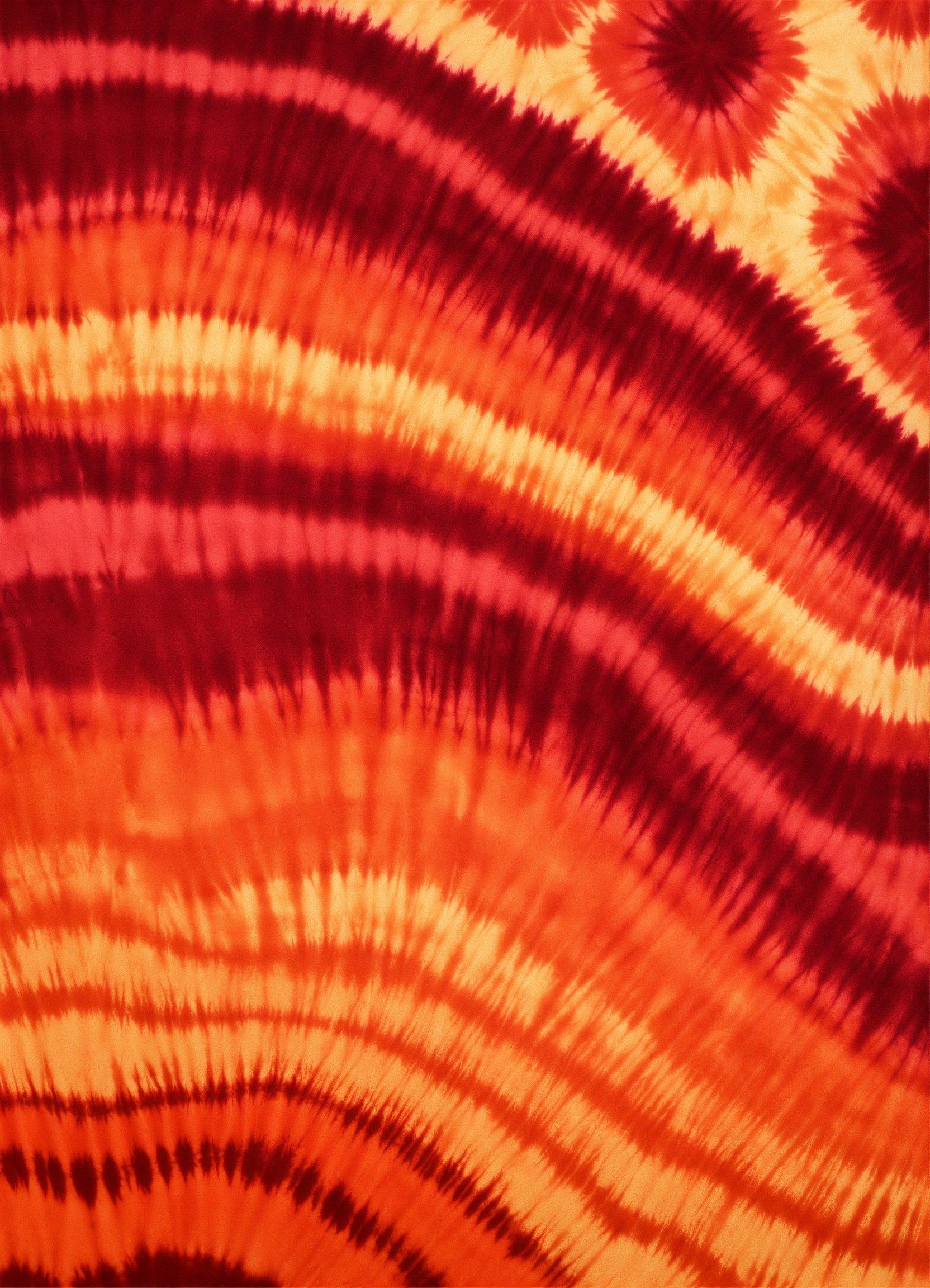 A Red And Yellow Tie - Dyed Background With Circles